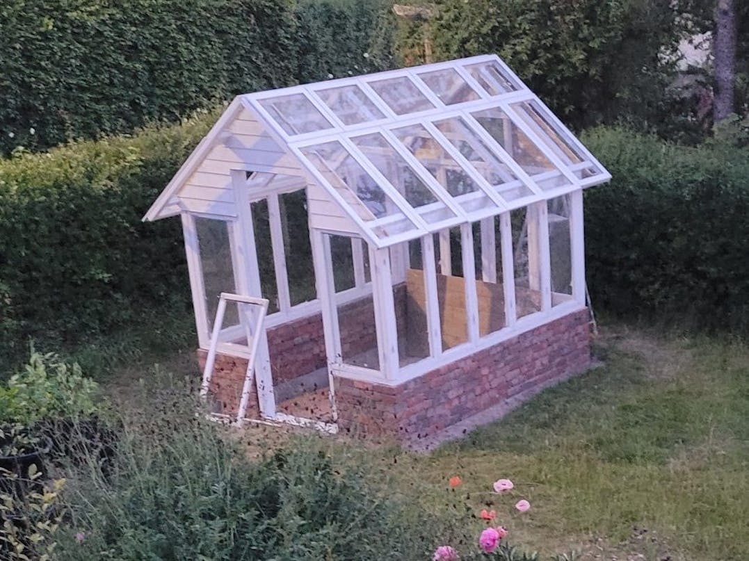 Orangeri af genbnrugsvinduer Orangeri af genbnrugsvinduer